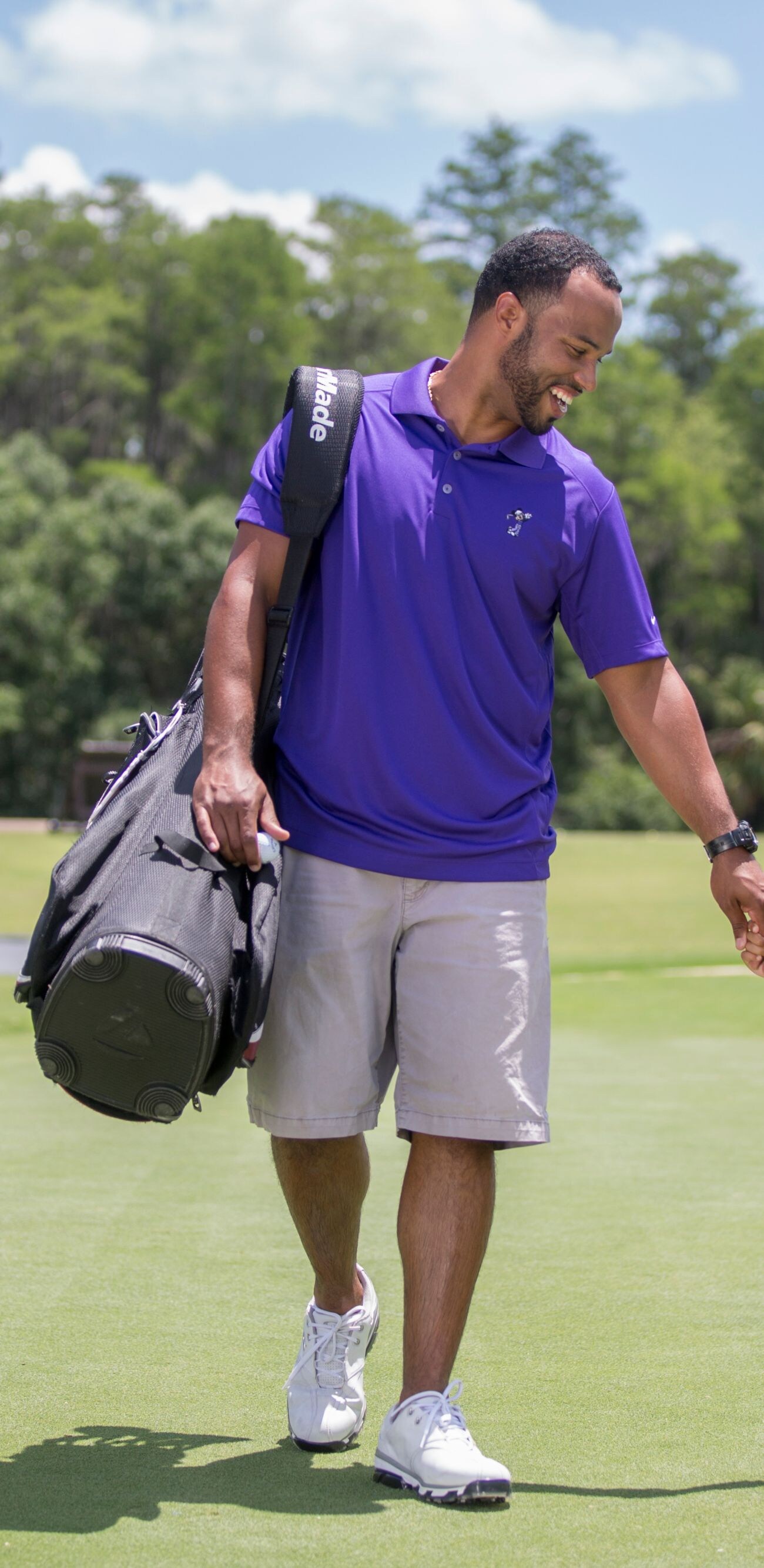 Dad and son golfing