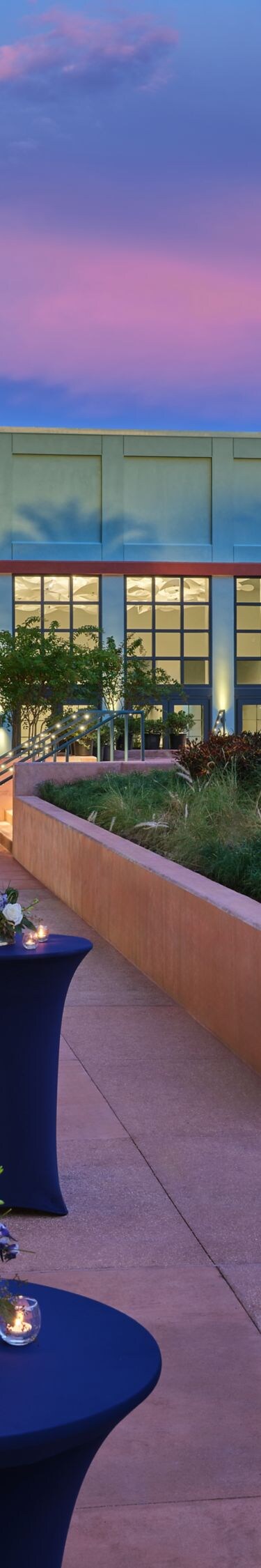Outdoor reception walkway at sunset