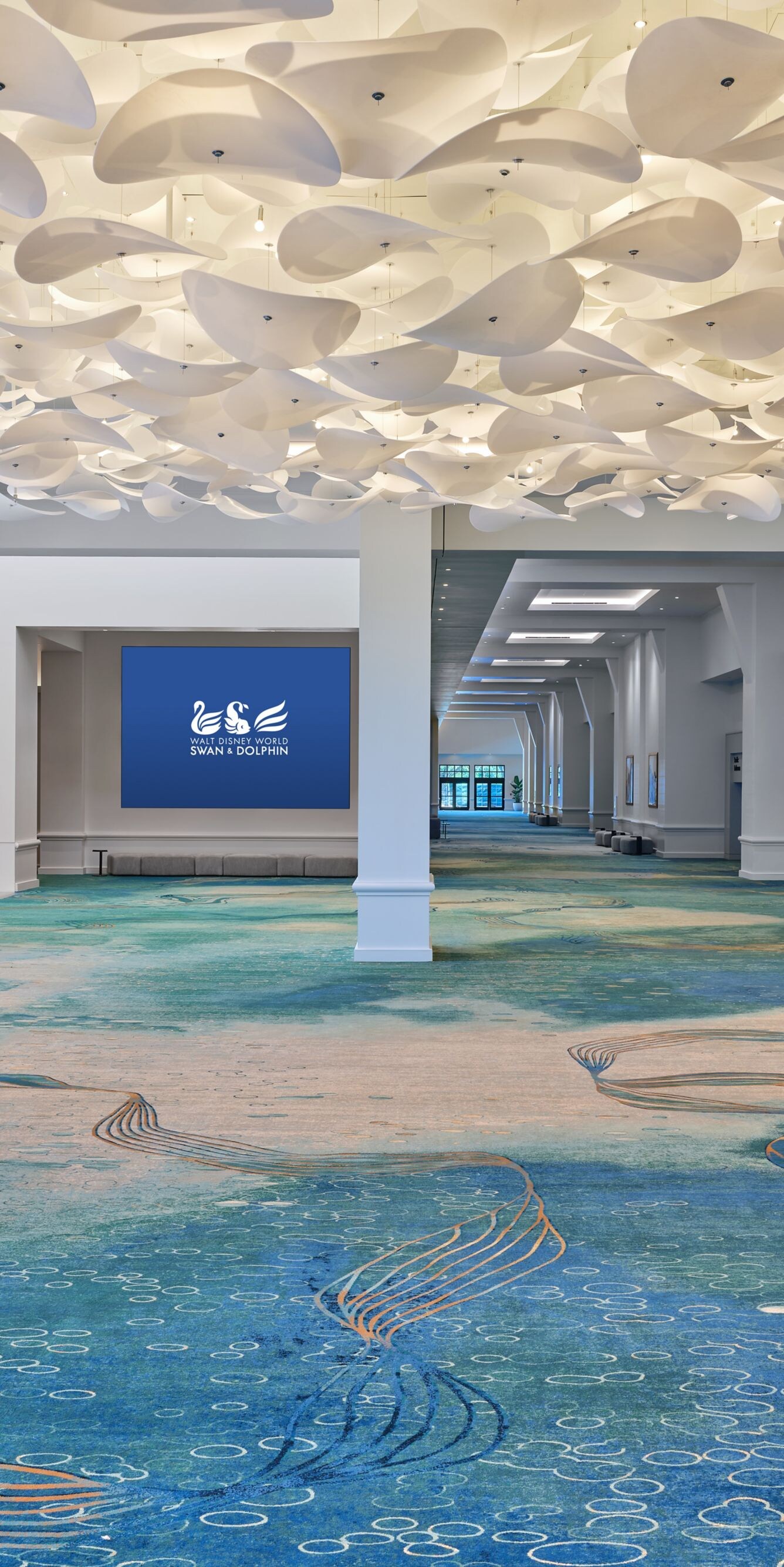 Peninsula prefunction space with ceiling sculpture