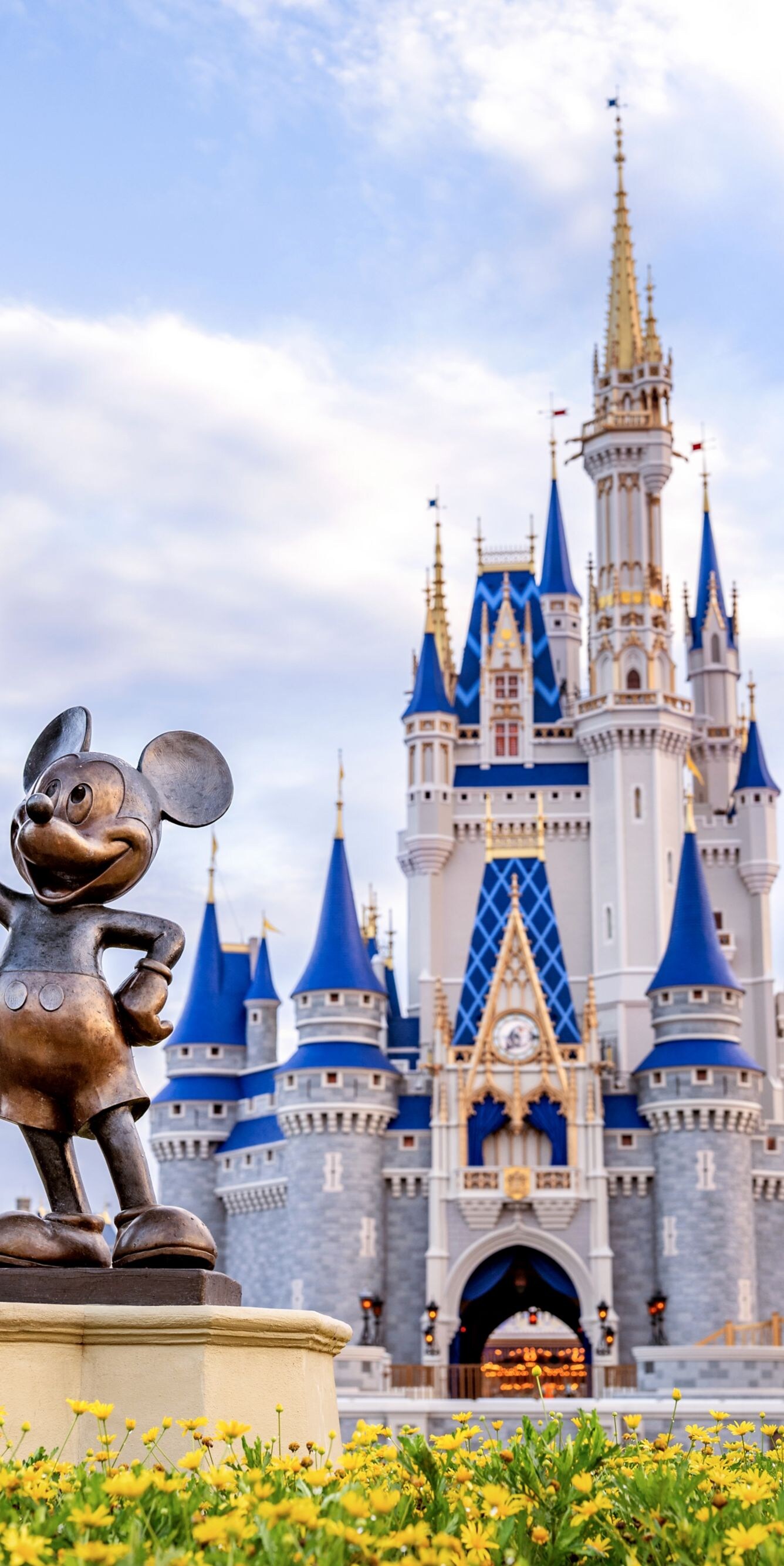 Partner statue with Cinderella Castle backdrop