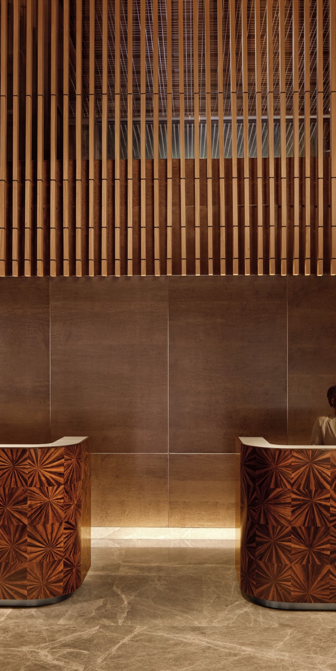 Close up view of the front desk with associates