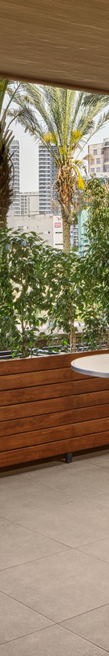 Terrace with cocktail tables and plants