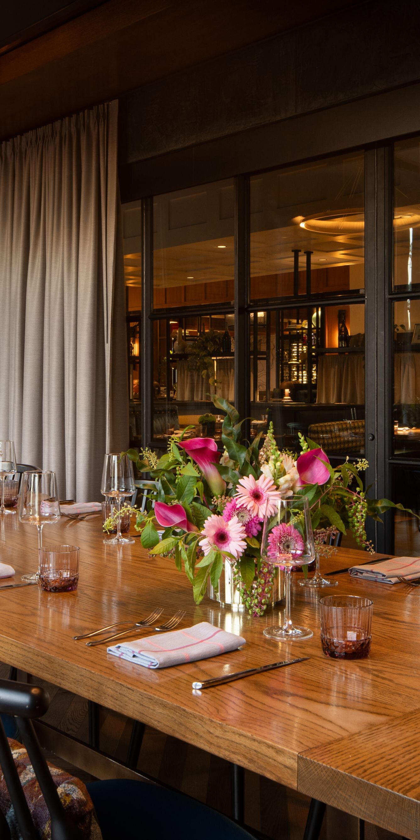 Private dining room with floral centerpieces