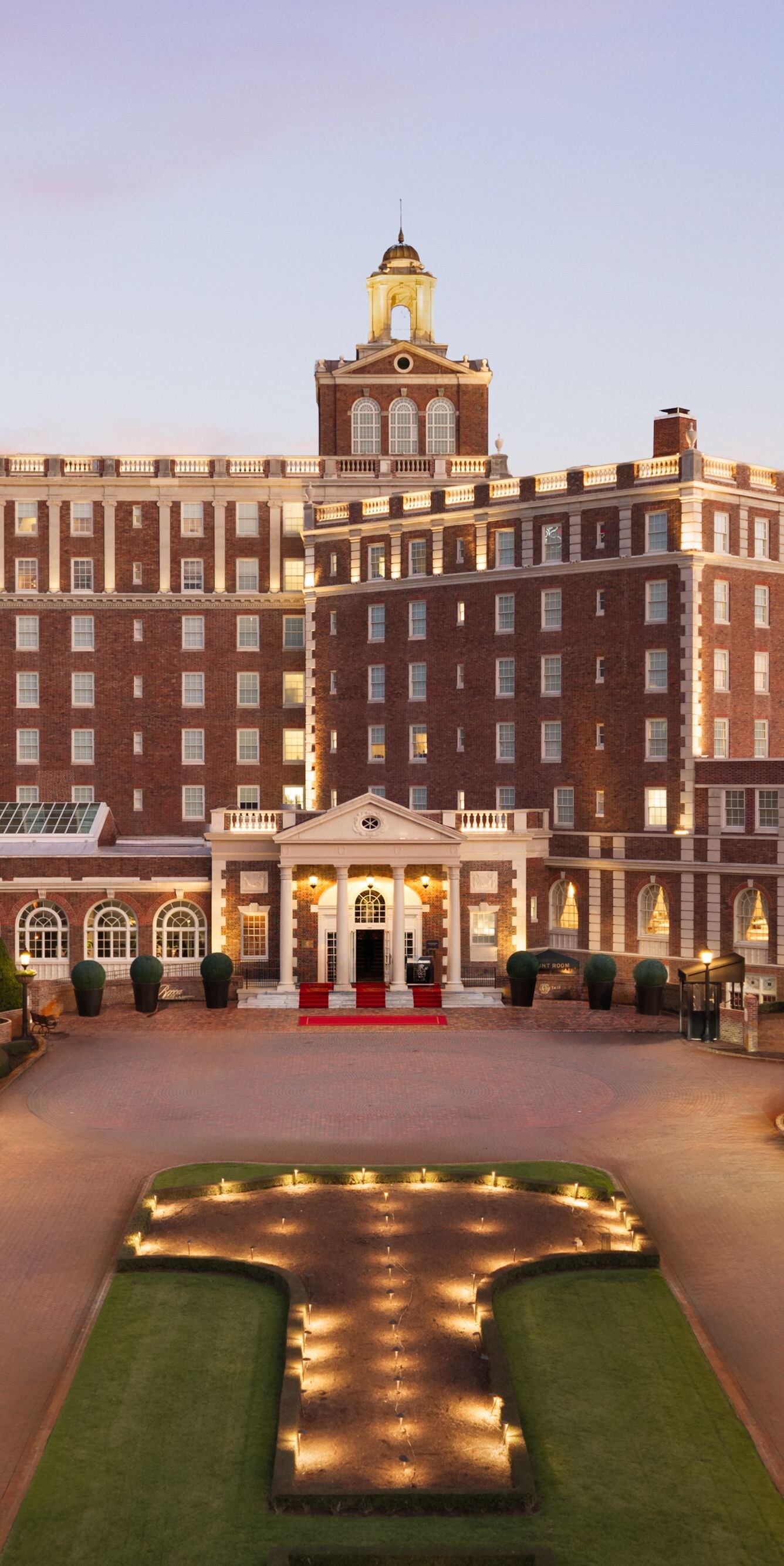 Historic hotel entrance at dusk
