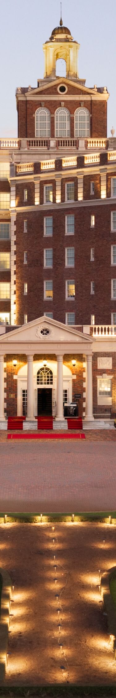 Historic hotel entrance at dusk