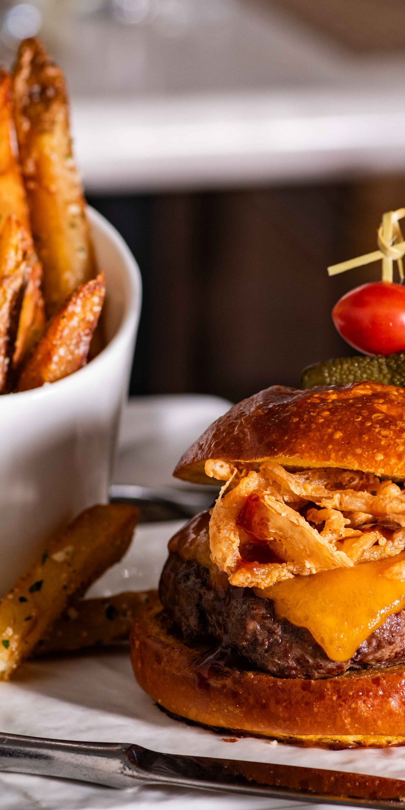 Cheeseburger served with french fries