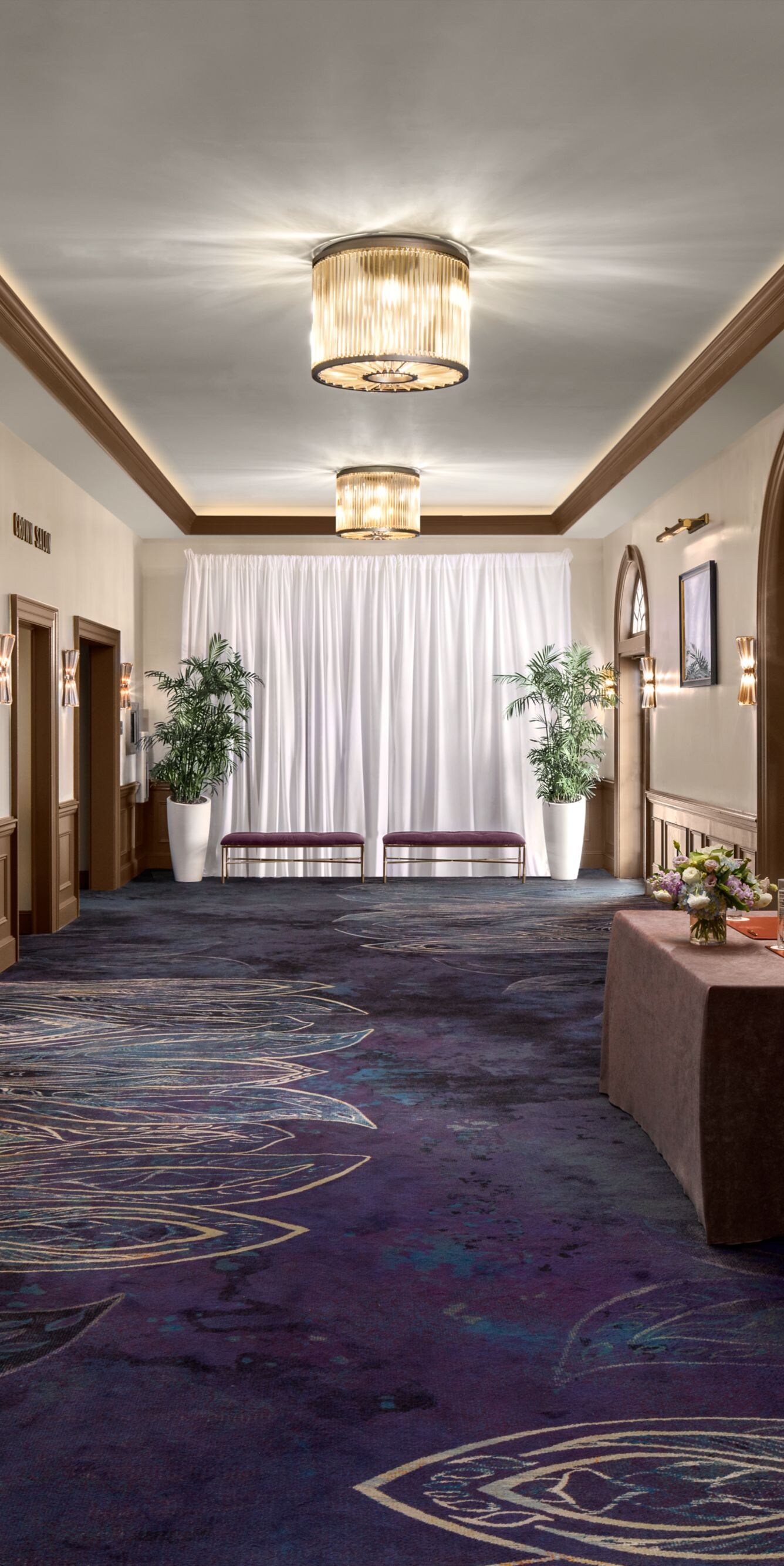 Hallway with seating and artwork