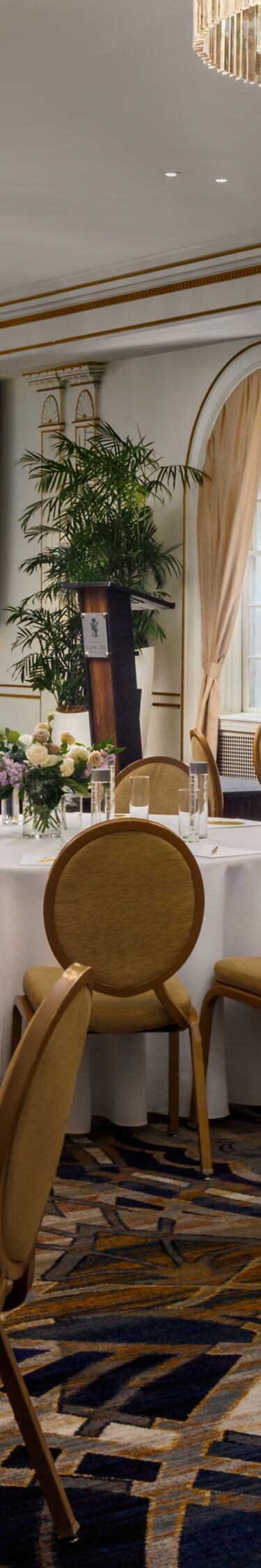 Banquet room with tables and stage