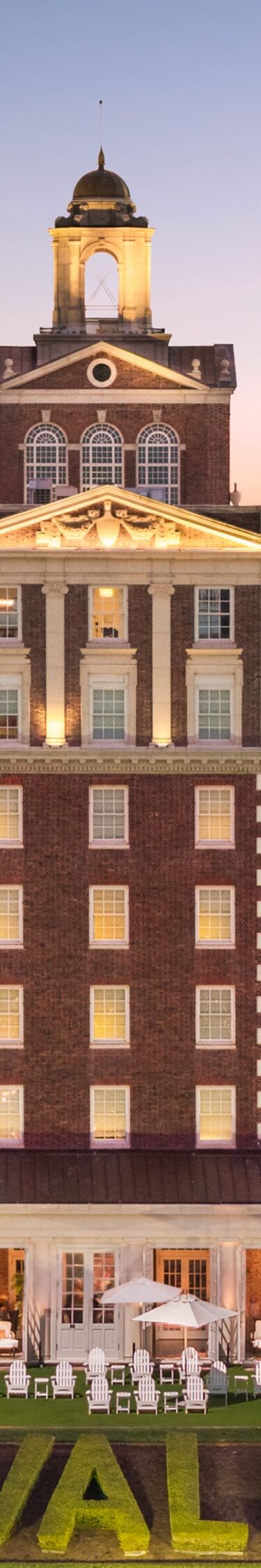 Historic resort exterior at sunset