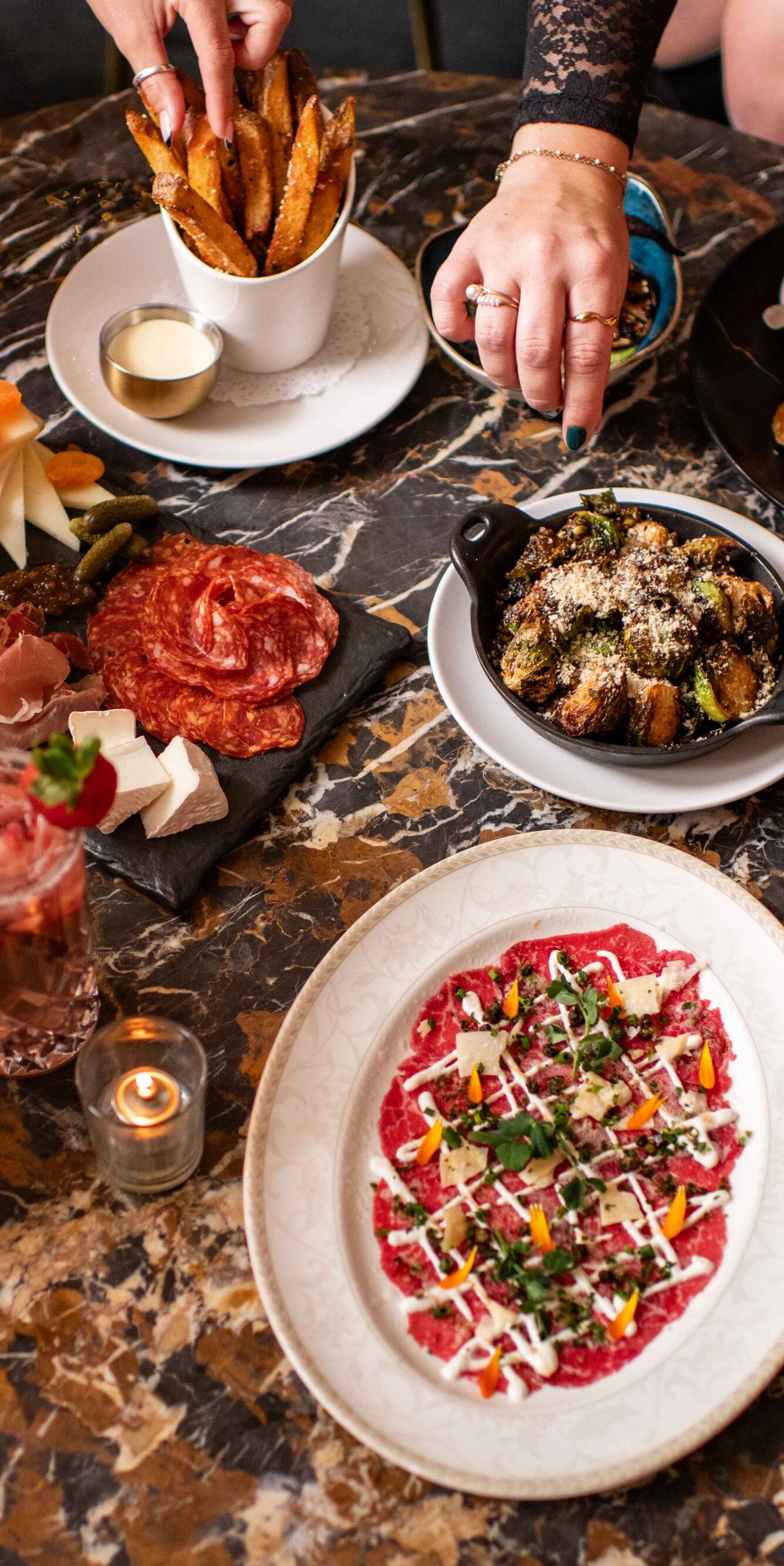 Small dishes being shared by friends
