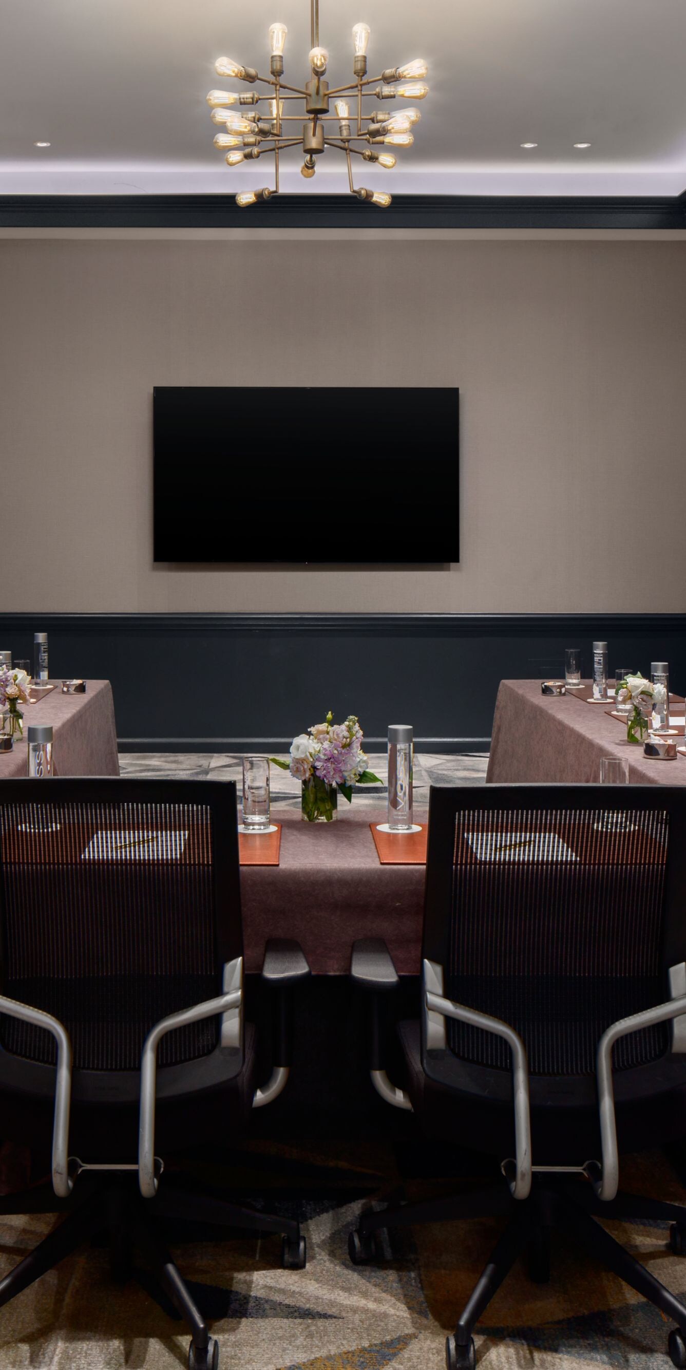 Meeting room with U-shape table and art
