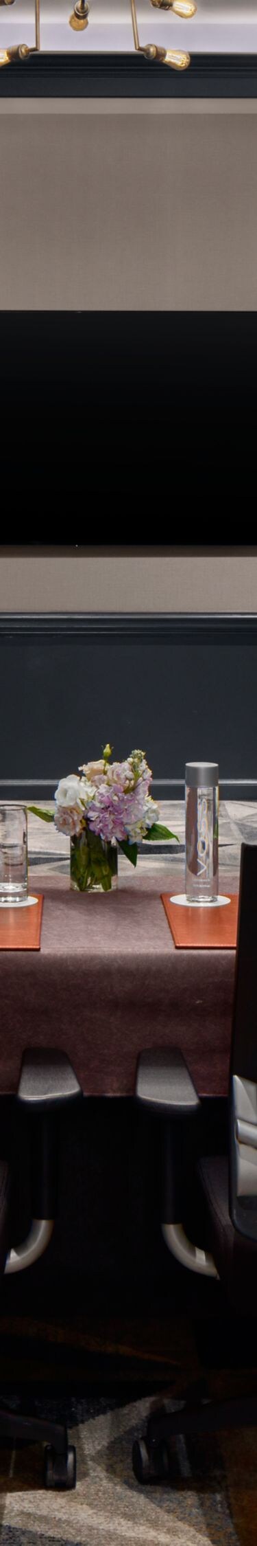 Meeting room with U-shape table and art