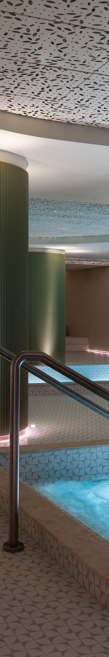 Wide view of the modern indoor wellness pool