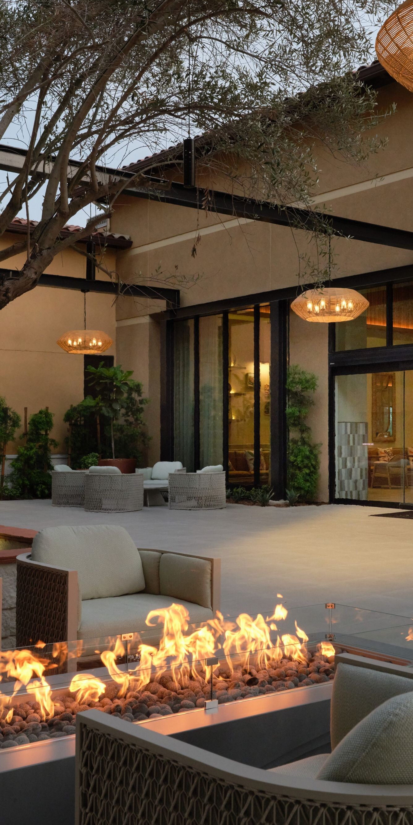 Courtyard seating with fire pit and trees
