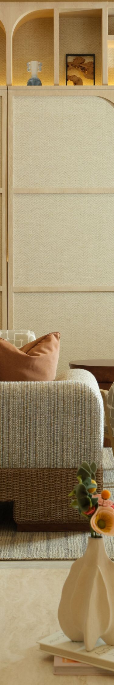 Lobby lounge seating with lit display shelves