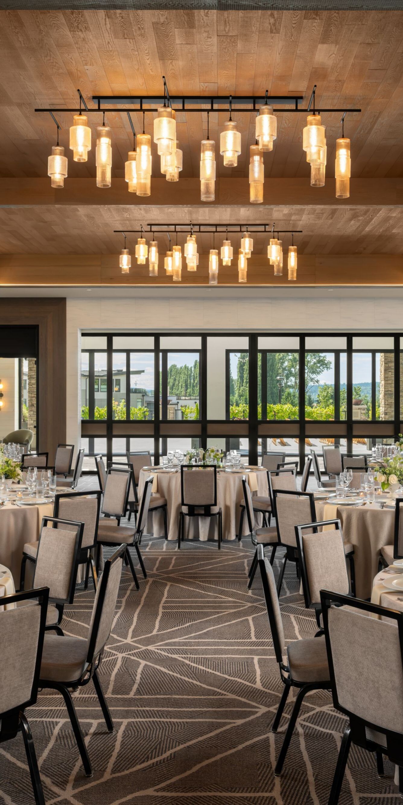 ballroom with tables and windows