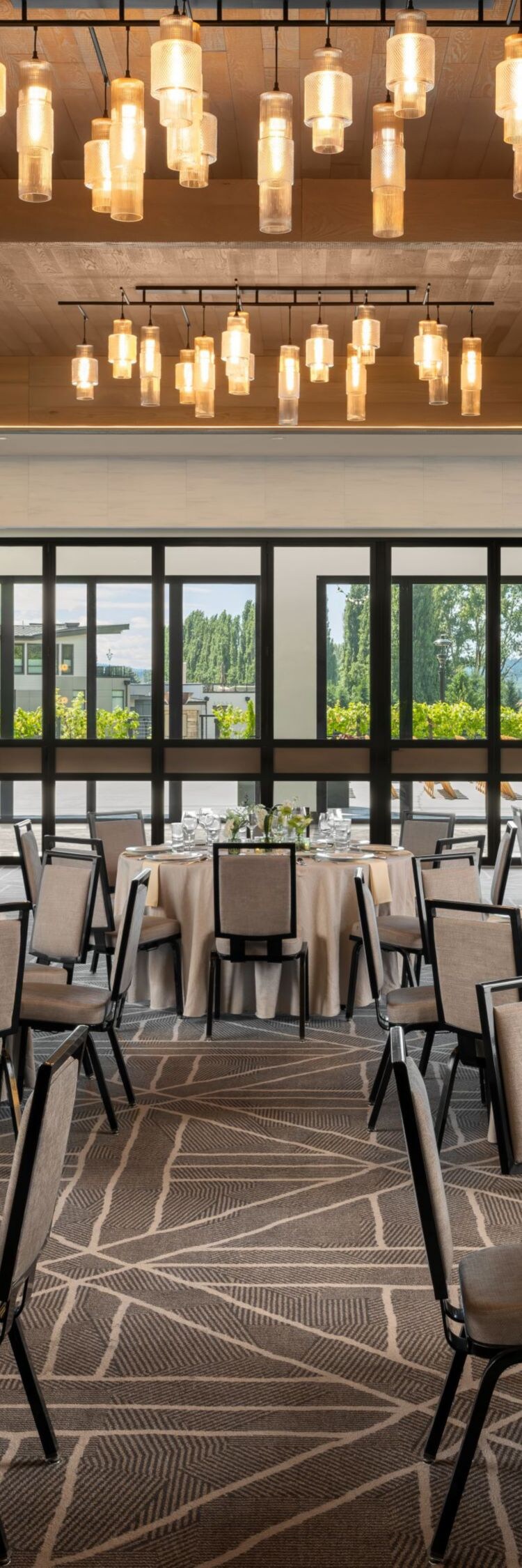 ballroom with tables and windows