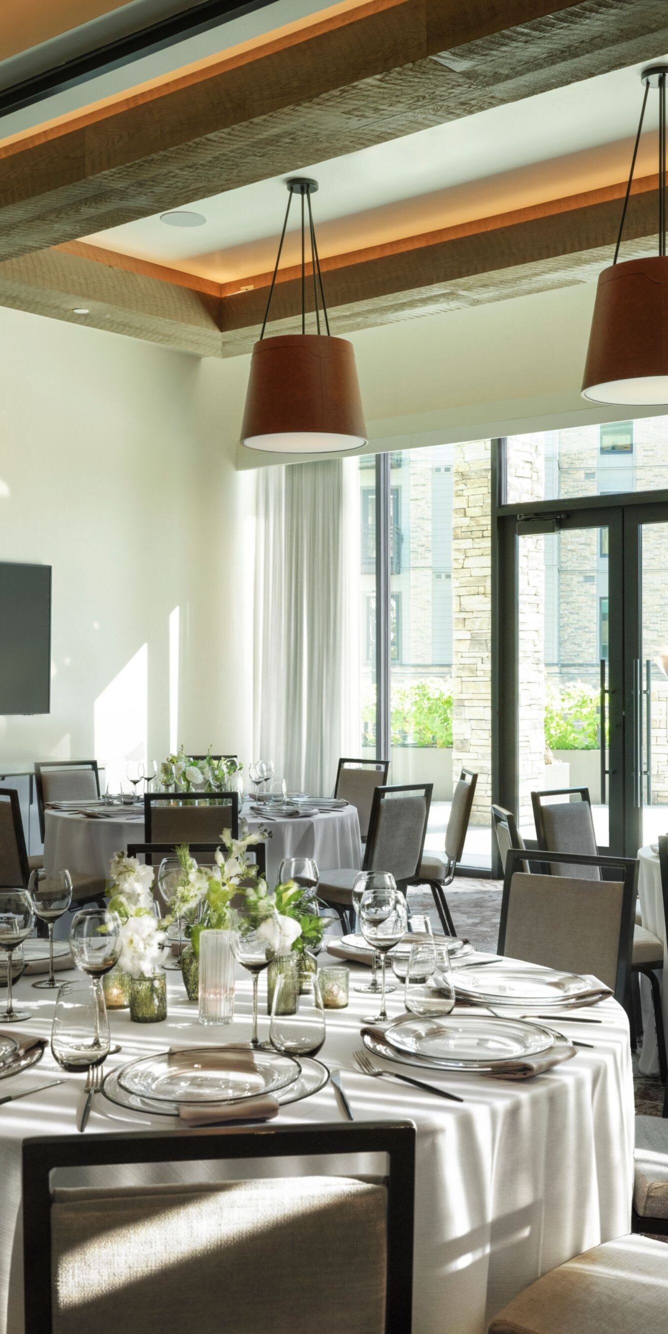 meeting room with tables and windows