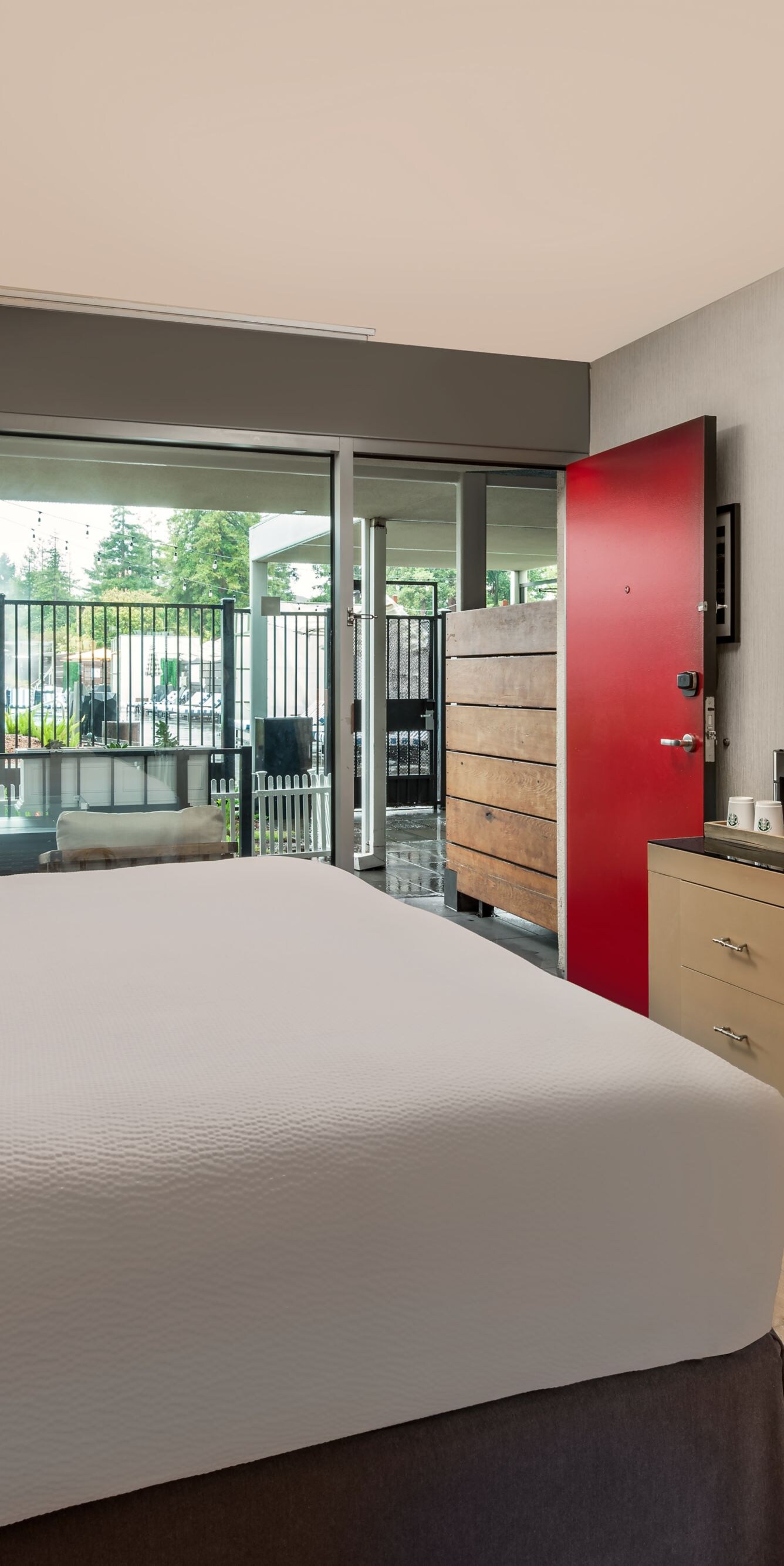 Modern hotel guest room with a king bed