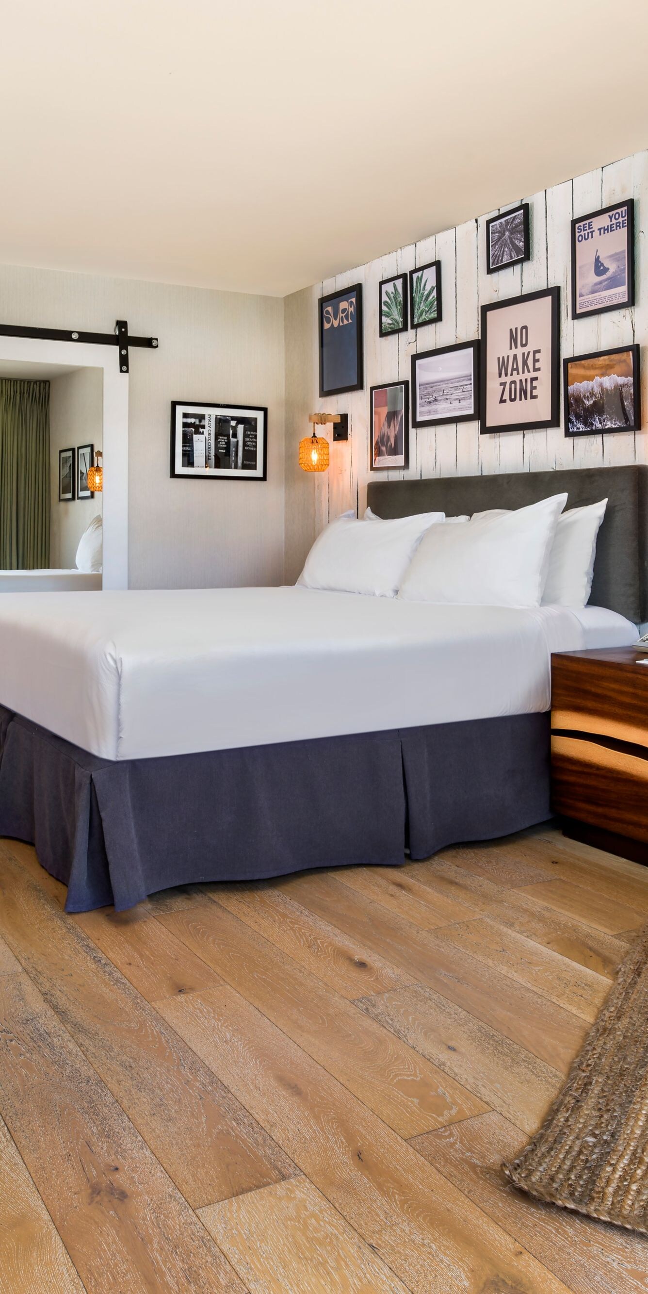 Guest room with king bed, desk, and sitting area