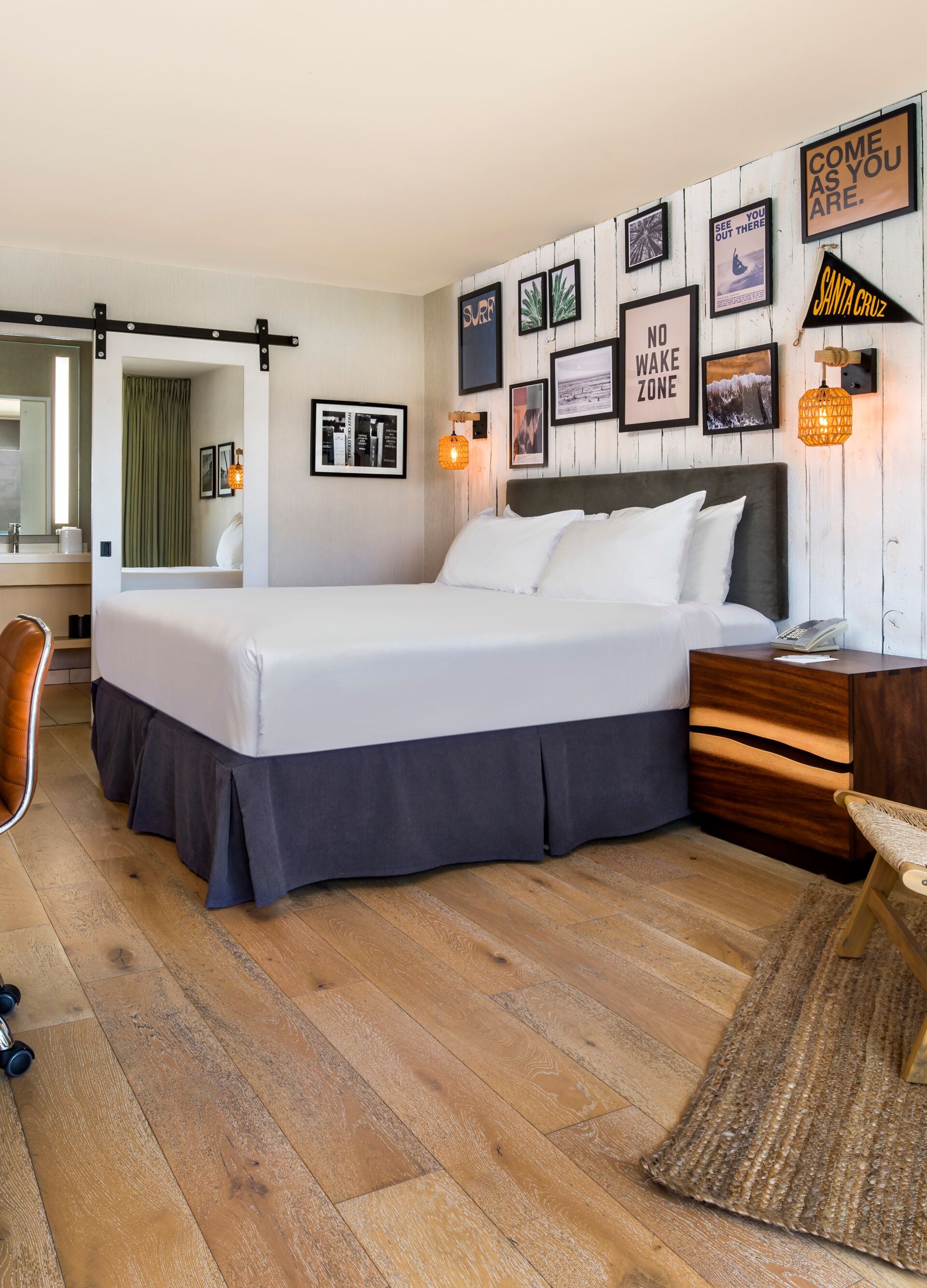 Guest room with king bed, desk, and sitting area