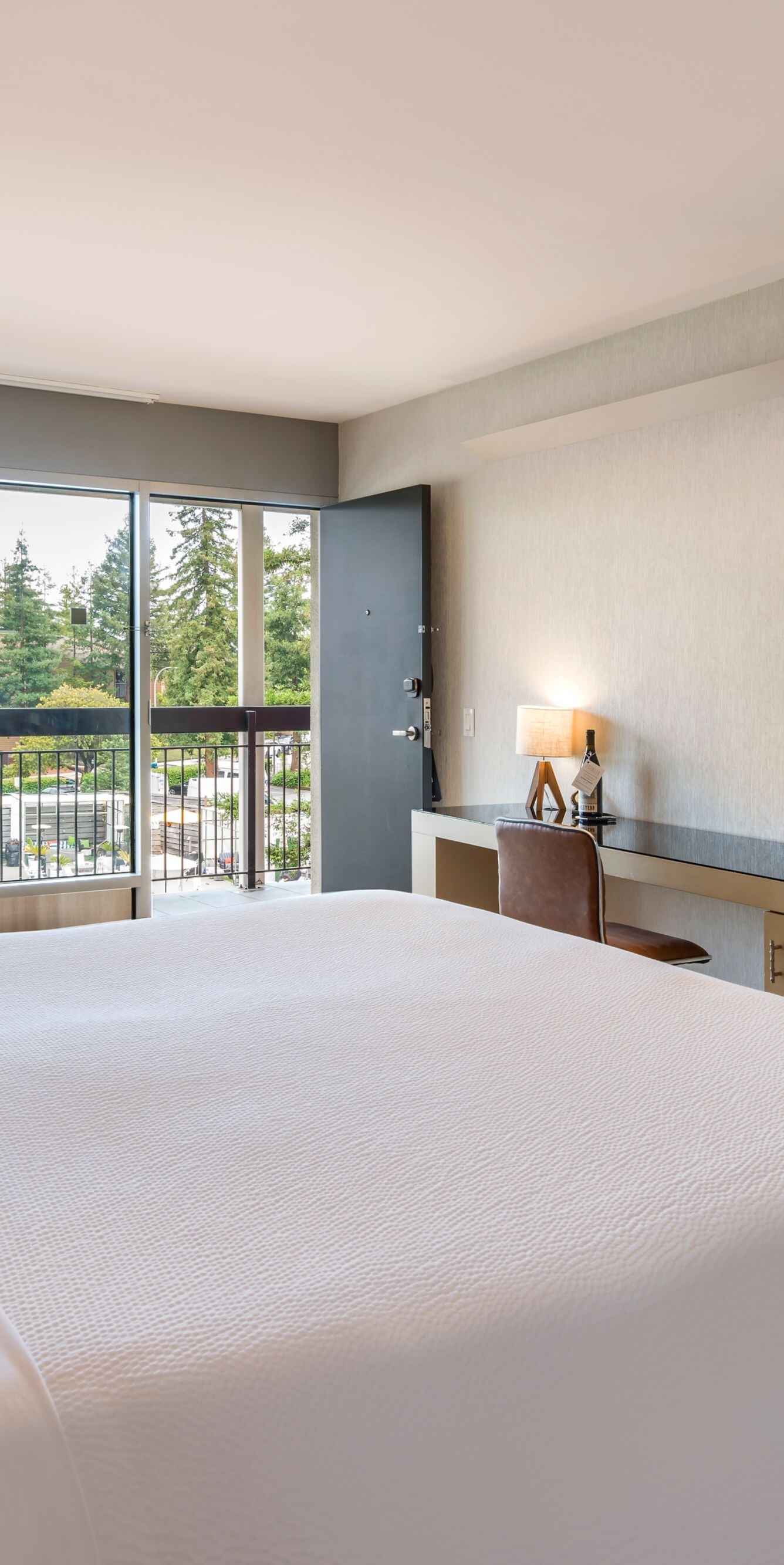 Pool view guest room with king bed