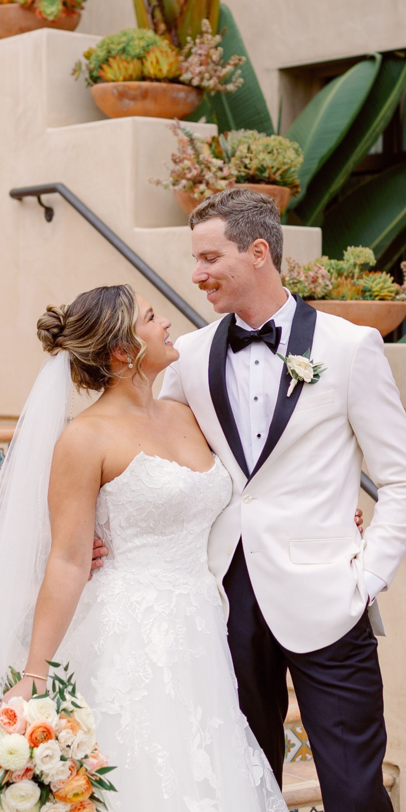 bride and groom gazing into each others eyes