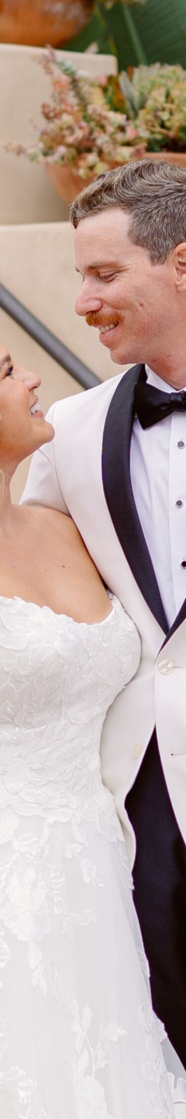 bride and groom gazing into each others eyes