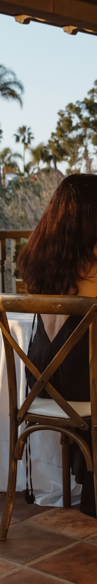 Couple enjoying dinner on an outdoor terrace with 