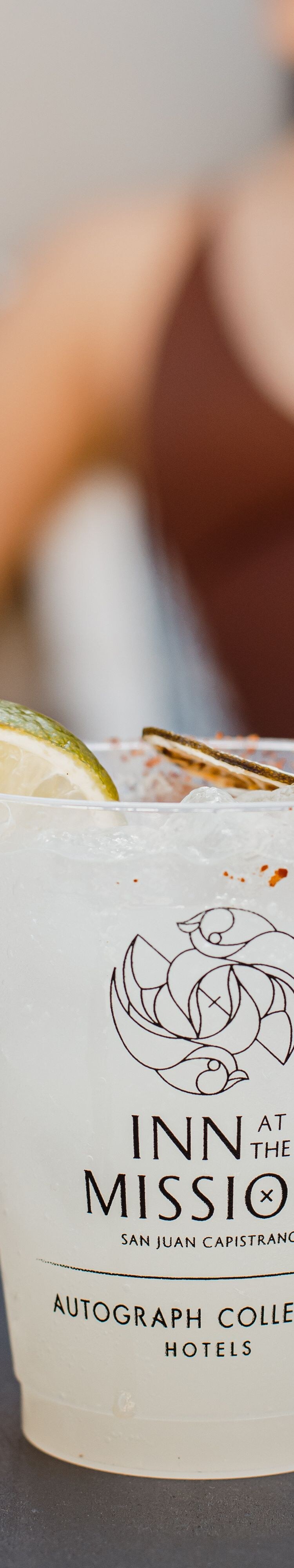 Margarita with chili rim and lime served alongside