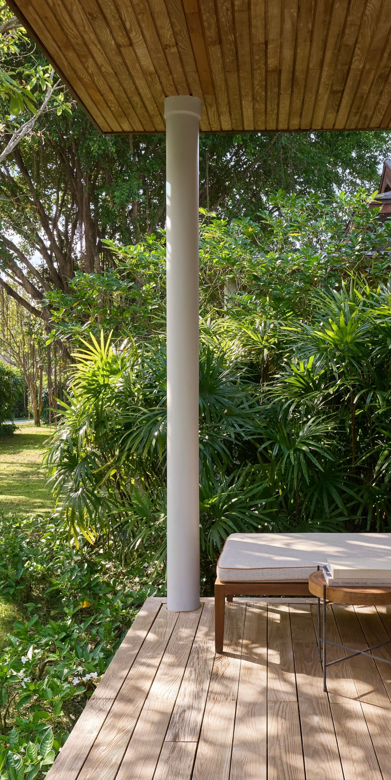 Private balcony surrounded by calming greenery.