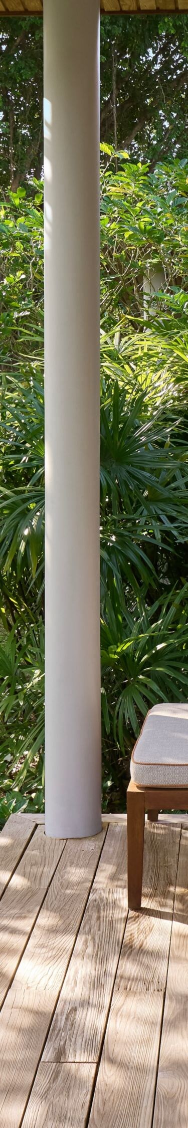 Private balcony surrounded by calming greenery.