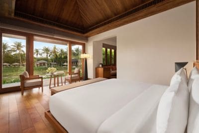 A tranquil king-bed retreat with a calm waterview.