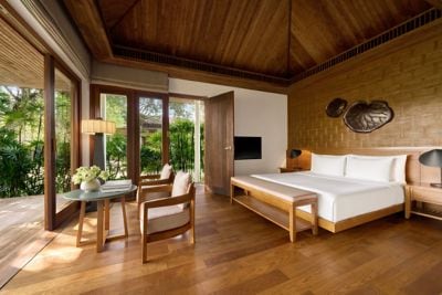 A serene king retreat with calming garden views.