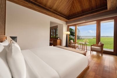 A serene king bungalow with calming water views.