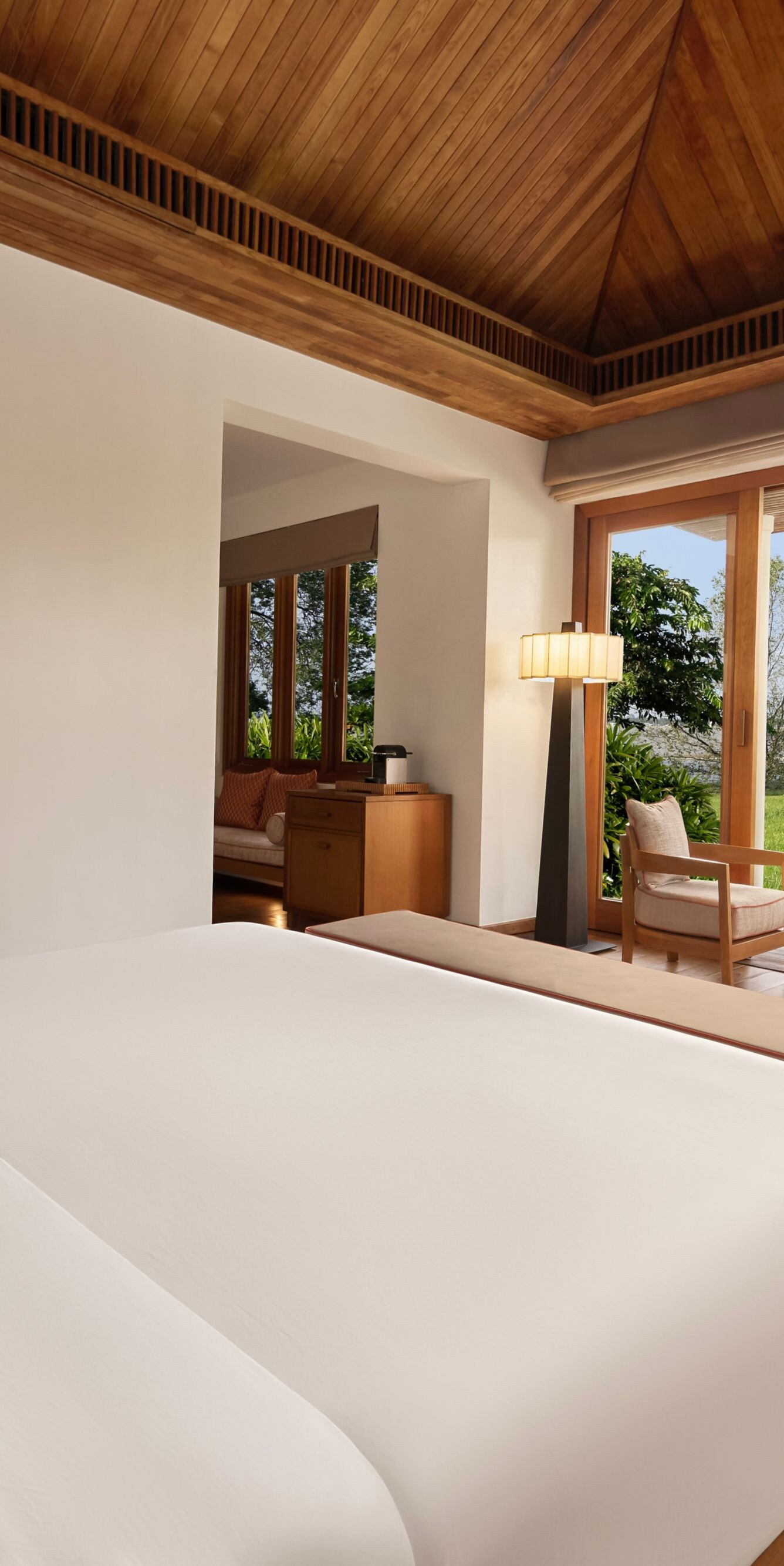 A serene king bungalow with calming water views.