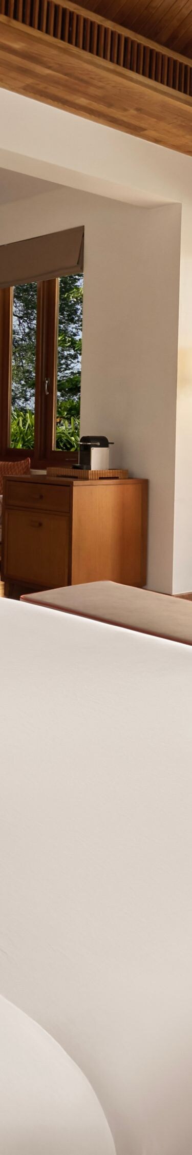 A serene king bungalow with calming water views.