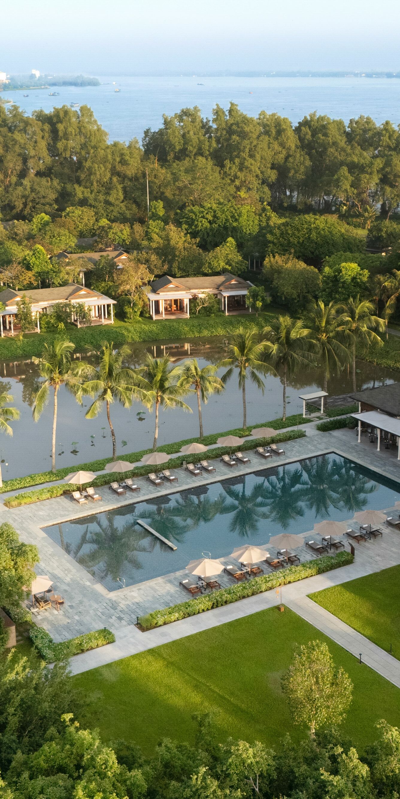Tranquil pool framed by nature.