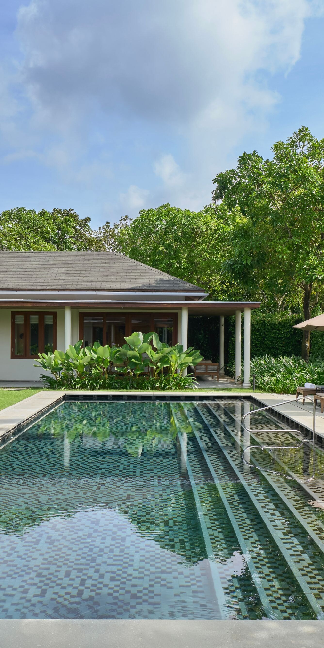 Private villa oasis with serene pool.