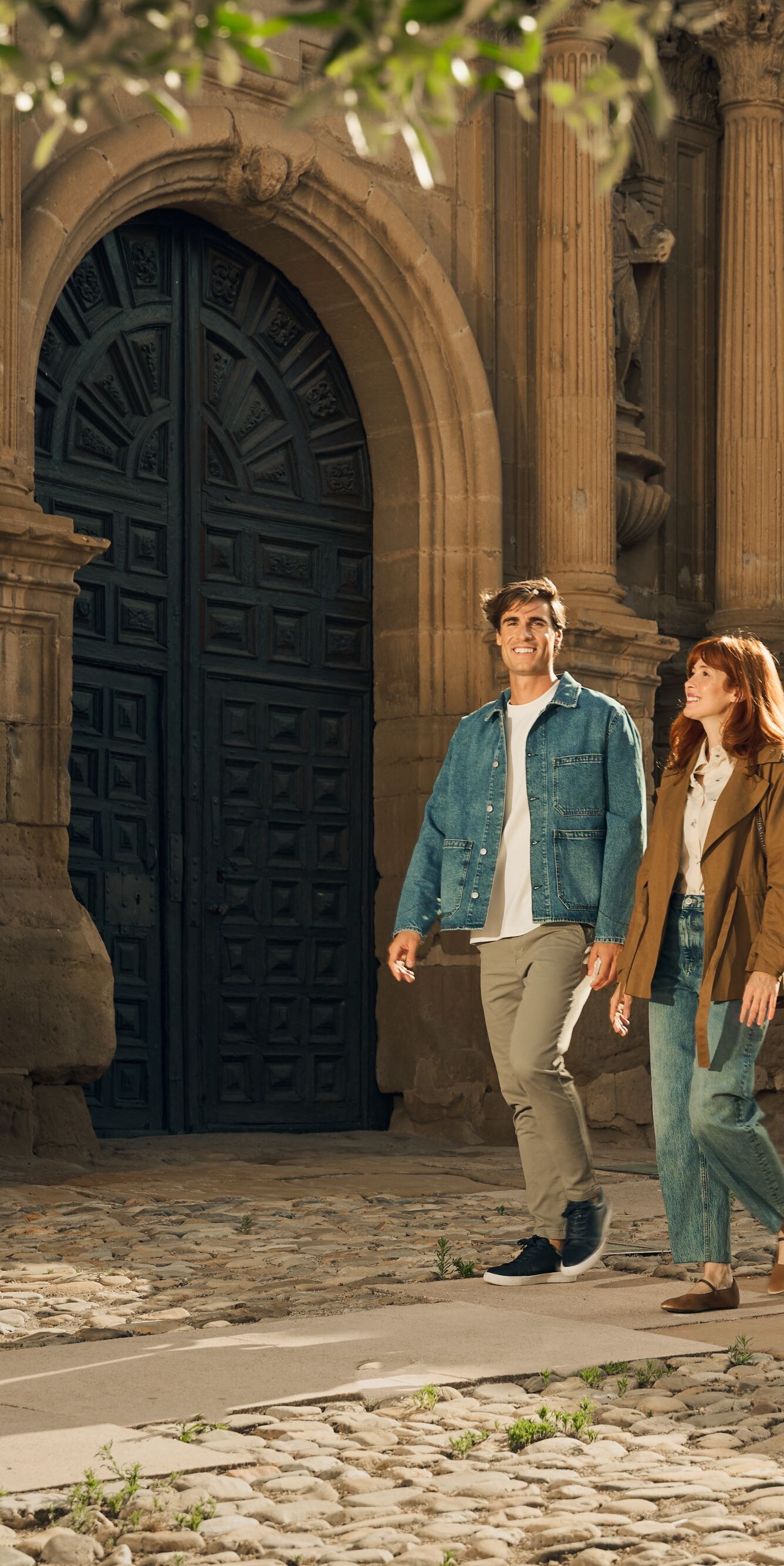 Couple walking through historic landmark