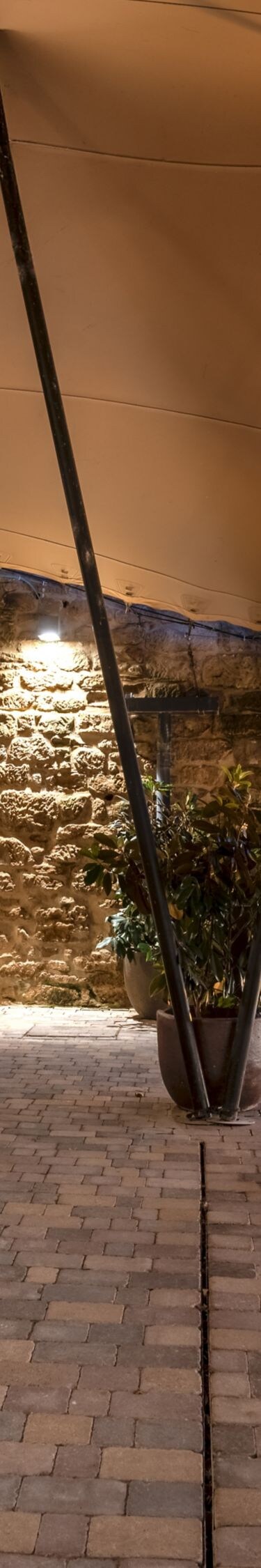 Outdoor terrace bar with stone walls