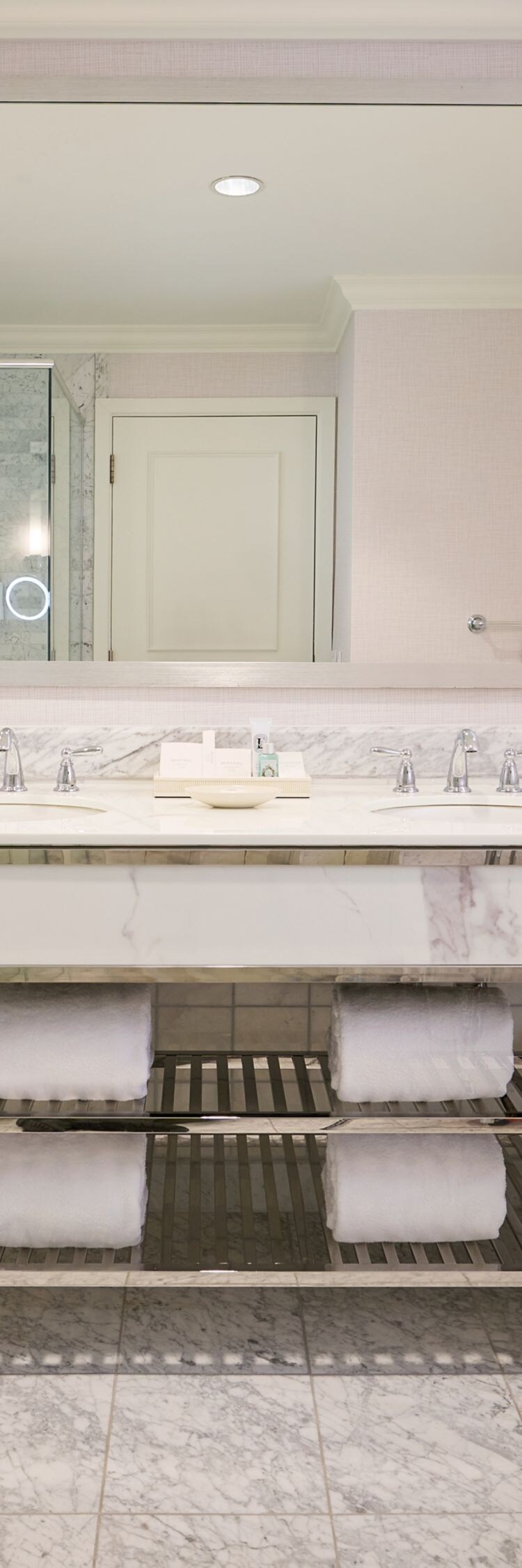 Marble bathroom with glass shower
