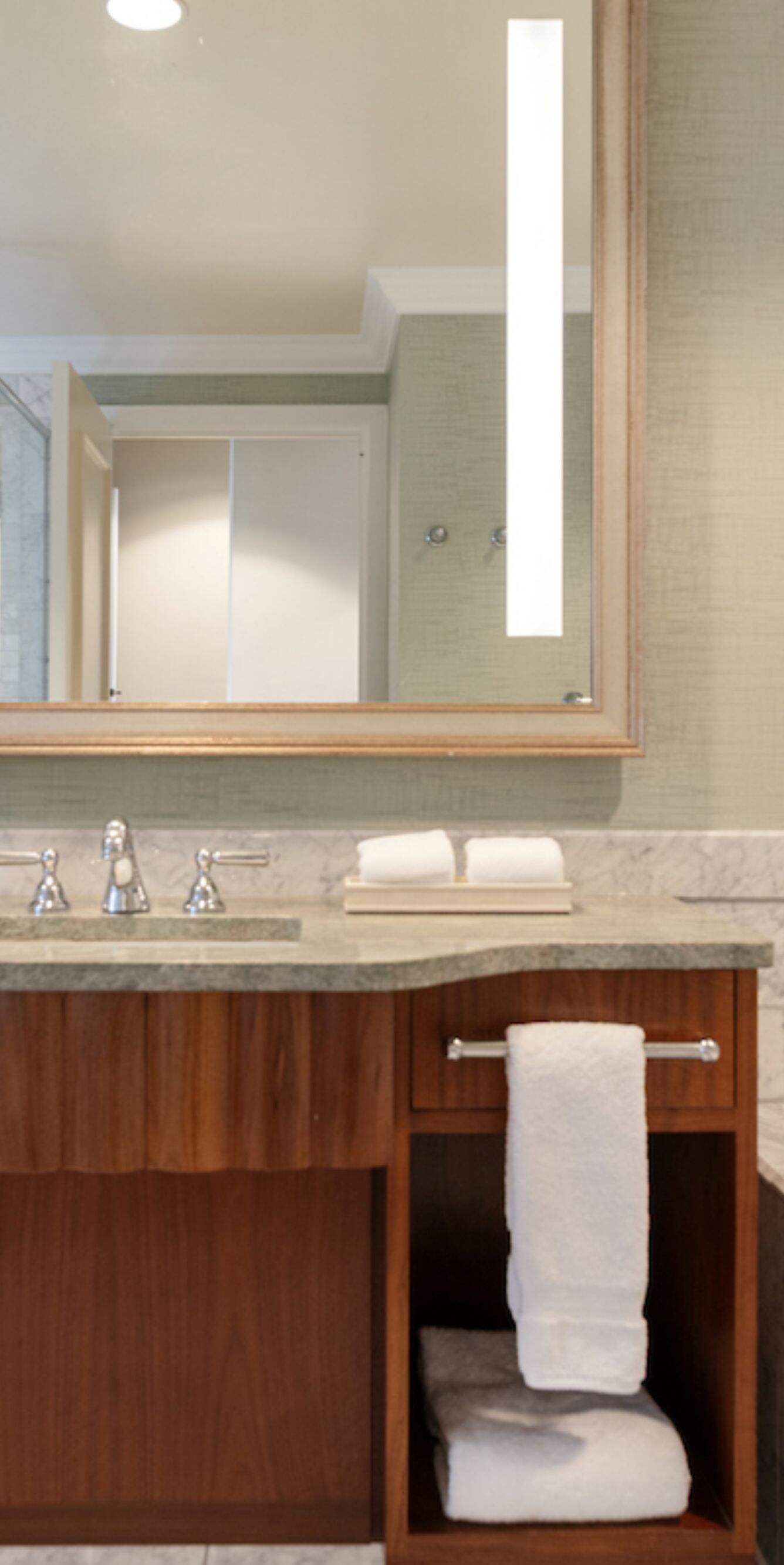 Marble bathroom with vanity and soaking tub