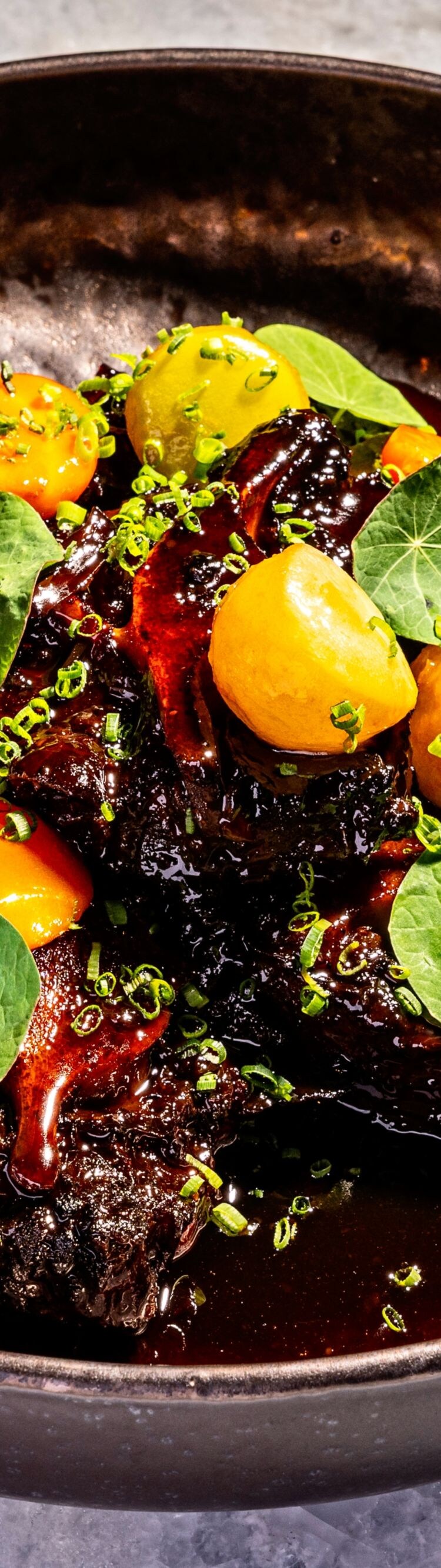 Braised oxtails with vegetables and sauce