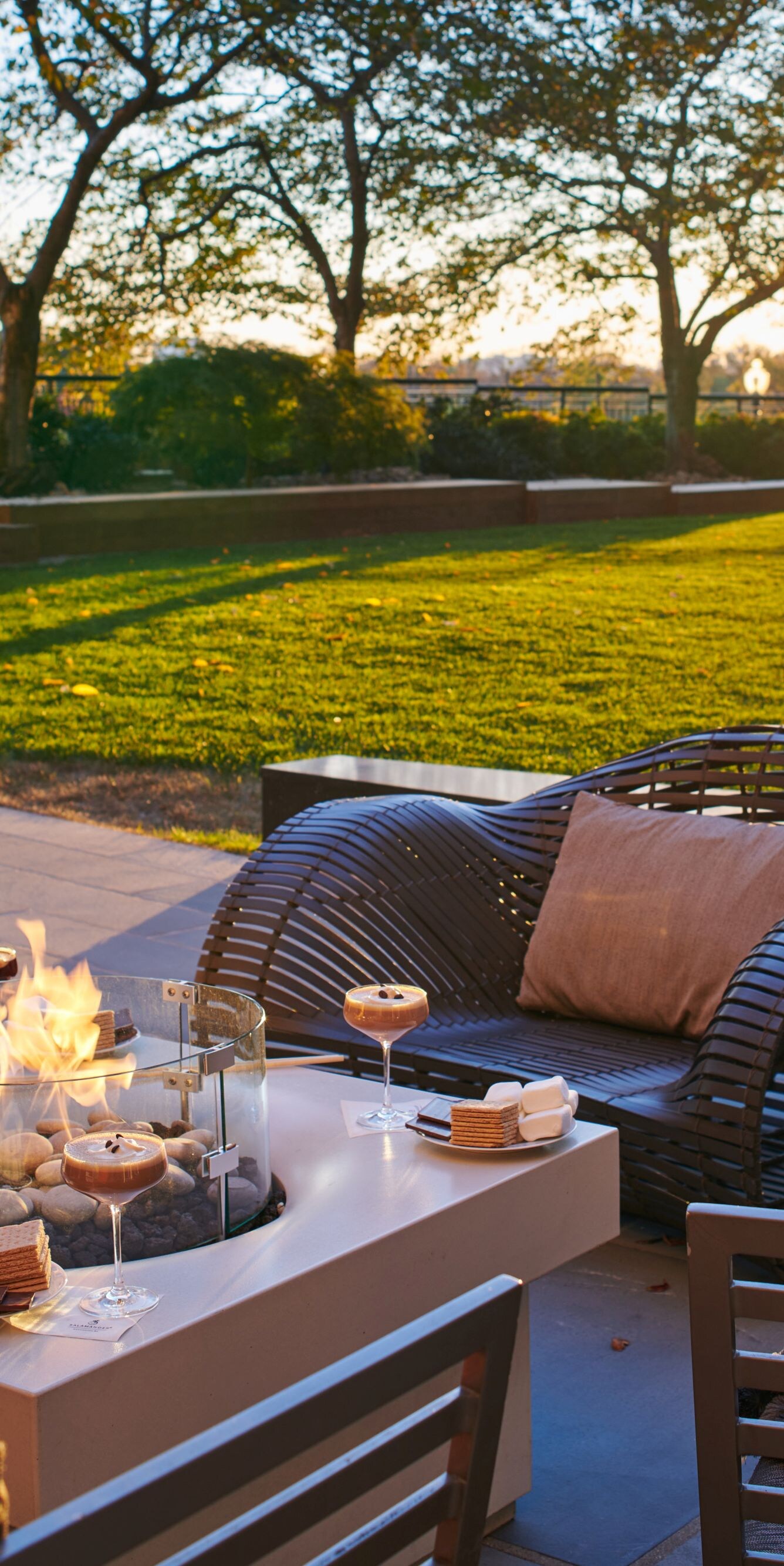 Guests enjoying s'mores by the fire pit