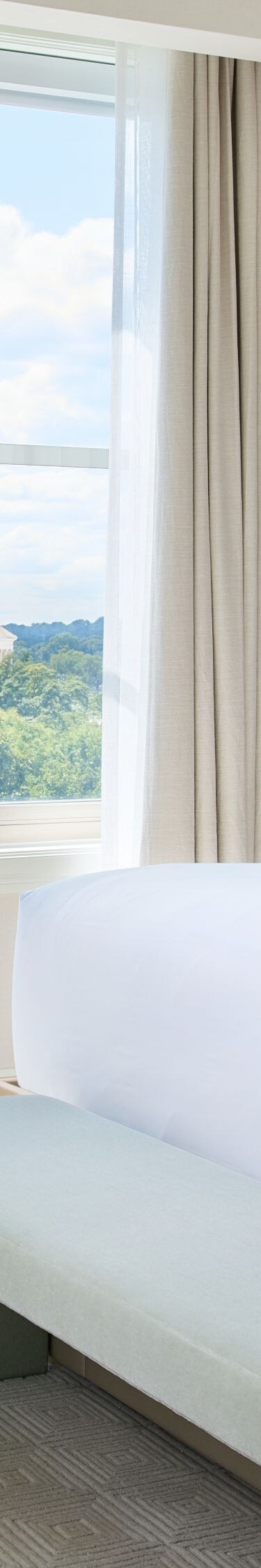 King guest room with large windows