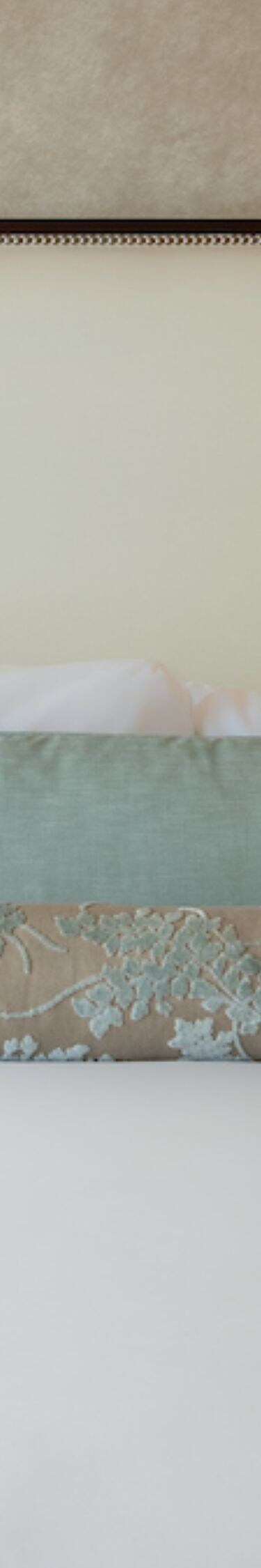 Deluxe king bed with luxury linens and lamps
