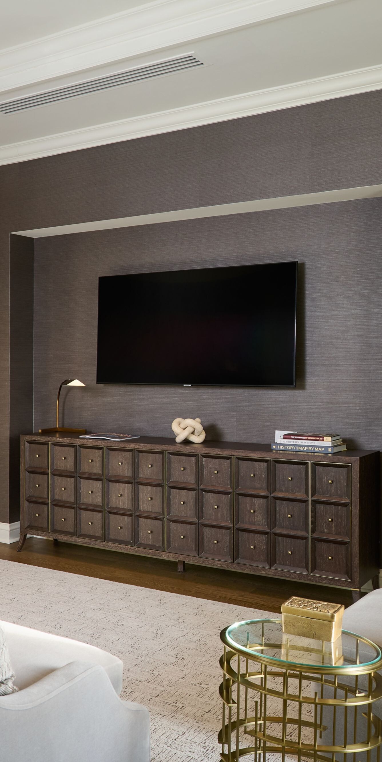 Living room with fireplace and TV