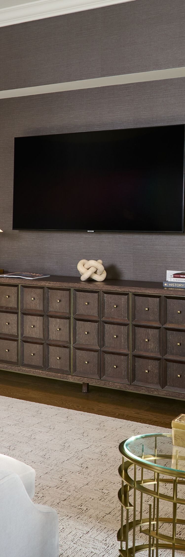 Living room with fireplace and TV