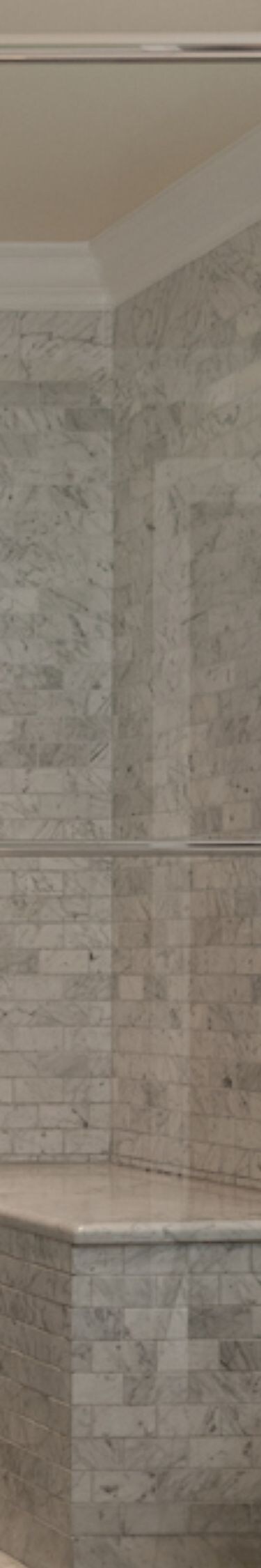 Marble bathroom with shower, tub, and vanity